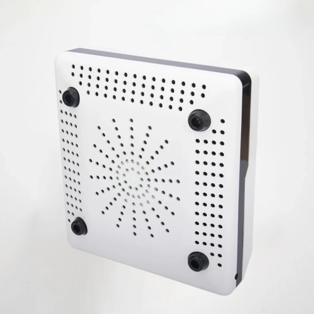 White electronic device with black dots on a white background