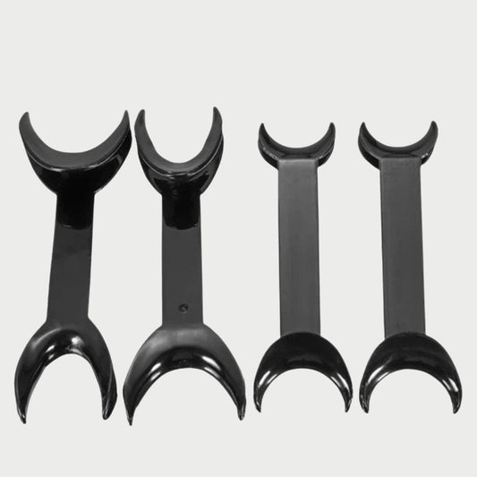 Four black plastic curved wall hooks arranged in descending sizes against a light gray background.