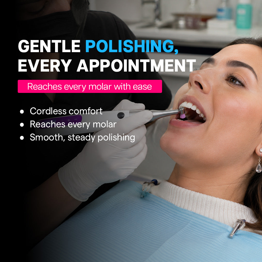 dentist using a cordless tooth polisher on a patient's molar