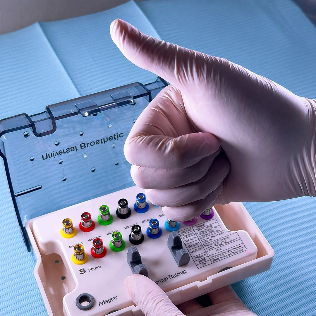16 color-coded implant drivers with compatibility chart